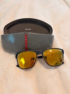 Prada Navy Frame Sunglasses with Yellow Mirror Lenses